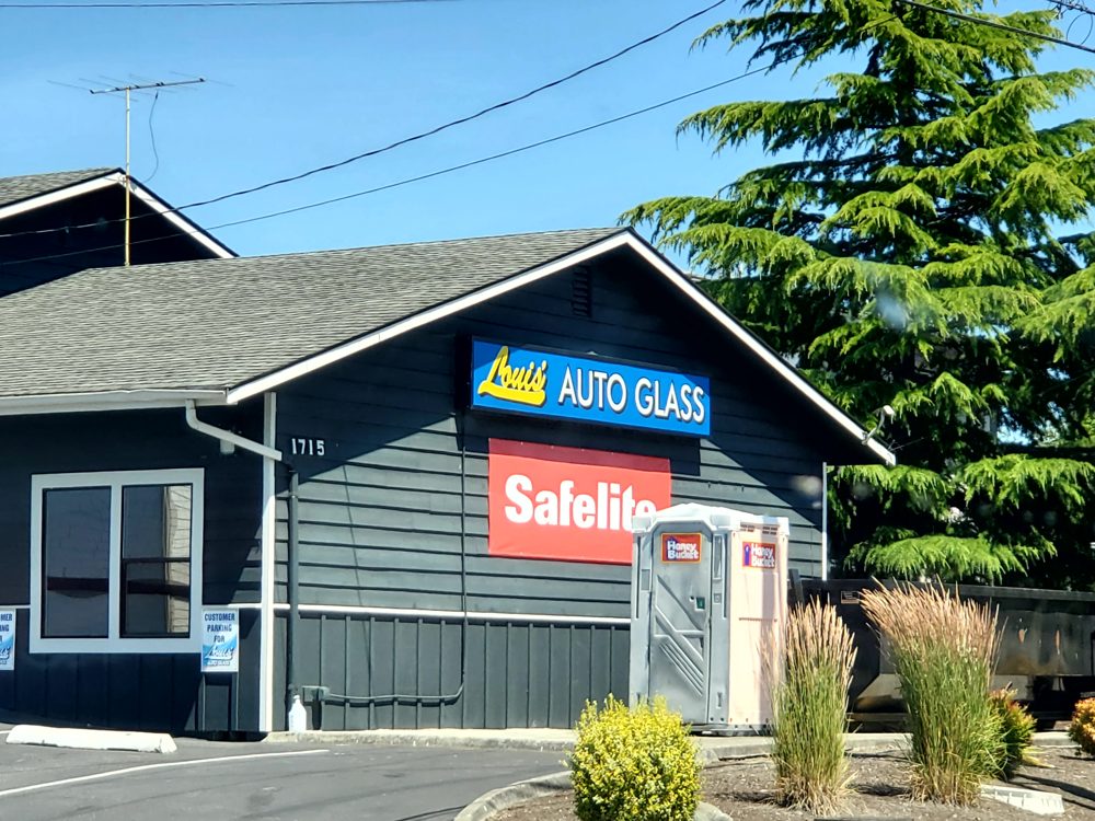 Louis Auto Glass building with a Safelite sign